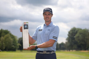 Michael Hollick poses with the trophy after winning the 2026 BMW International Open.