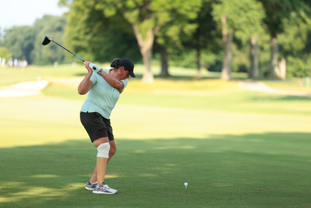 Kim Moore plays her tee shot on the first hole during a practice round ahead of the 2026 U.S. Adaptive Open.