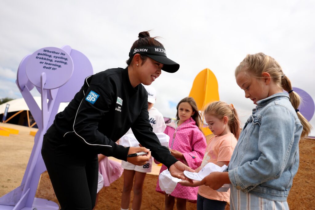 Defending champion Miyu Yamashita signs autographs ahead of the 2026 AIG Women's Open.