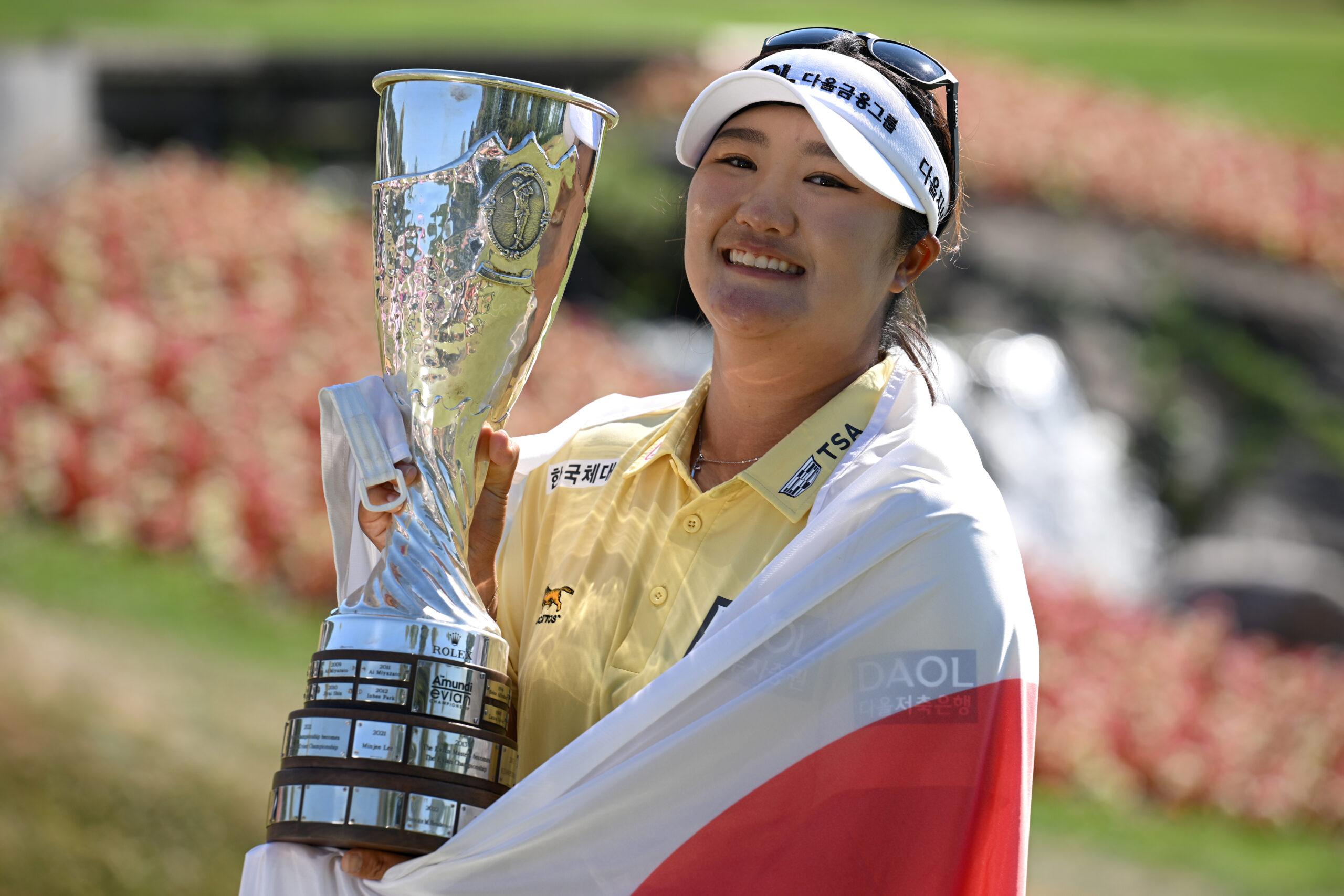 Haeran Ryu of South Korea poses for a photo with the trophy following her victory of the 2026 Amundi Evian Championship.