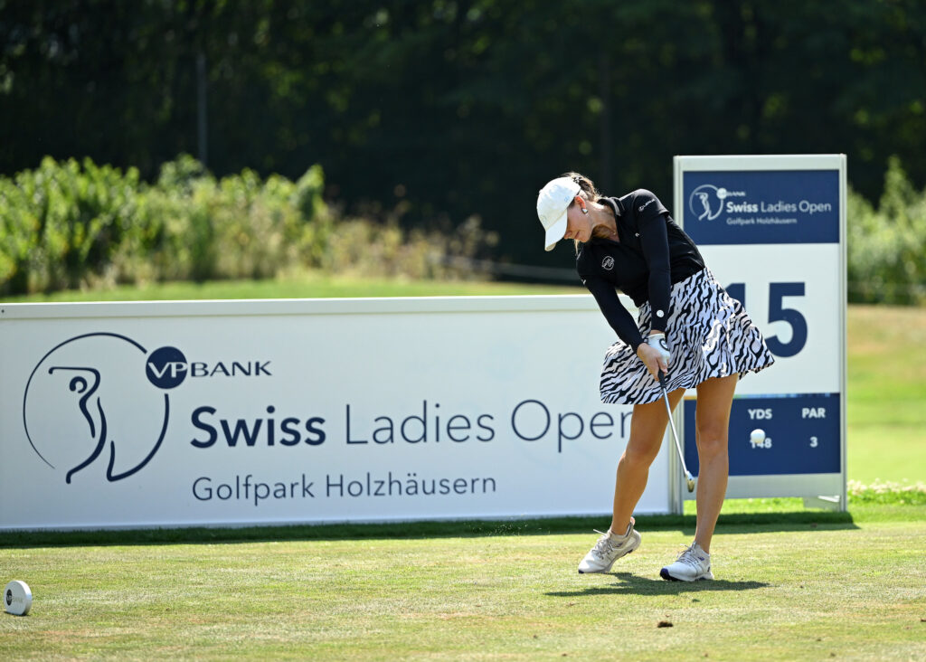The Ladies European Tour continues this week at the 2026 VP Bank Swiss Ladies Open. The tournament will be held at Golfpark Holzhäusern for the seventh consecutive year. England’s Alice Hewson is in the field to defend her title after winning the VP Bank Swiss Ladies Open the last two years.Golfpark Holzhäusern is a par 71 playing 6,288 yards. The golf course opened in 1995 as the first public golf course in Switzerland with 36 holes. The purse for the VP Bank Swiss Ladies Open is €350,000.The VP Bank Swiss Ladies Open will be a 54-hole event, rather than the standard 72-hole format seen in previous weeks.Who to Watch at the 2026 VP Bank Swiss Ladies OpenOnly one winner on the Ladies European Tour this season is in the field this week. The 2026 Amundi German Masters winner, Leonie Harm, is looking for her second win after her remarkable comeback from injury. She has not played well recently, only making the cut once in her last seven starts.Defending champion Hewson is looking for her first win this season. She has three top-10 finishes, with her best finish of fifth coming at the MCB Ladies Classic - Mauritius. If she wins this event three times in a row, she’ll be only the second player to ever do so besides Annika Sörenstam.““It would be unbelievable,” said Hewson. “I’ve met Annika several times, she’s a fantastic human being and has done so much for the sport so to be said in the same sentence as her would be pretty cool.”Seven Swiss players are in the field this week. One player to watch is Vanessa Knecht. Knecht played golf at Wake Forest University for four years before turning professional in January of 2023 and joining the LET.