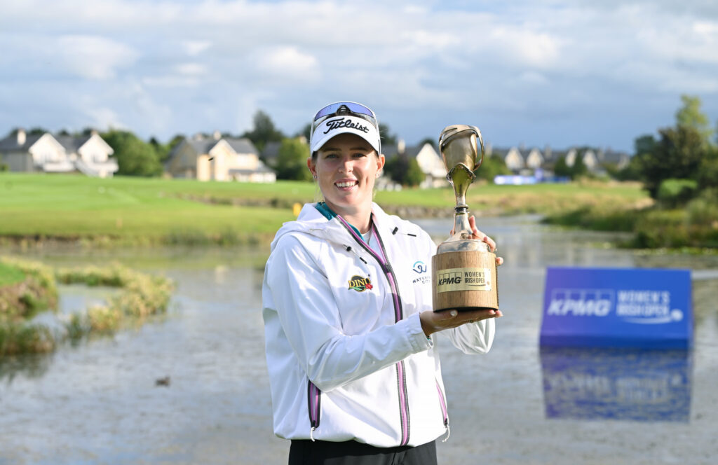 Casandra Alexander holds up her second LET trophy.