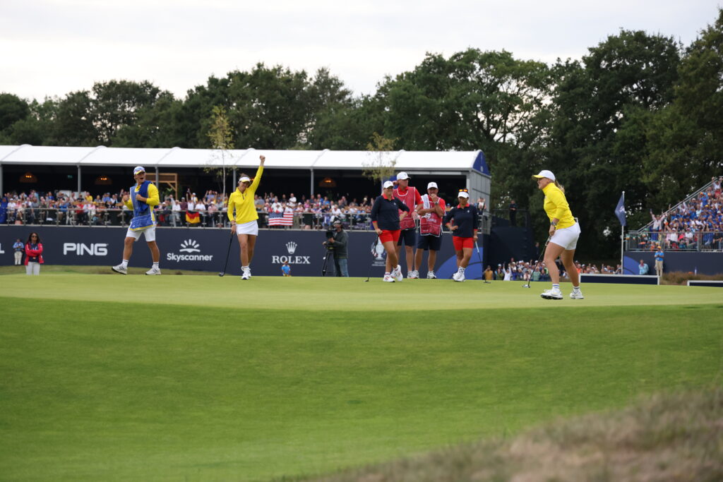 Linn Grant celebrates while Maja Stark's birdie putt wins Team Europe another match point.