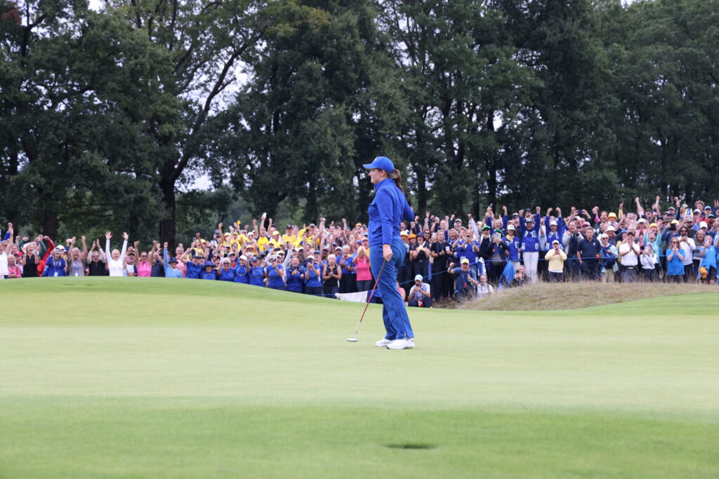 Lottie Woad realizes she made the winning putt. 