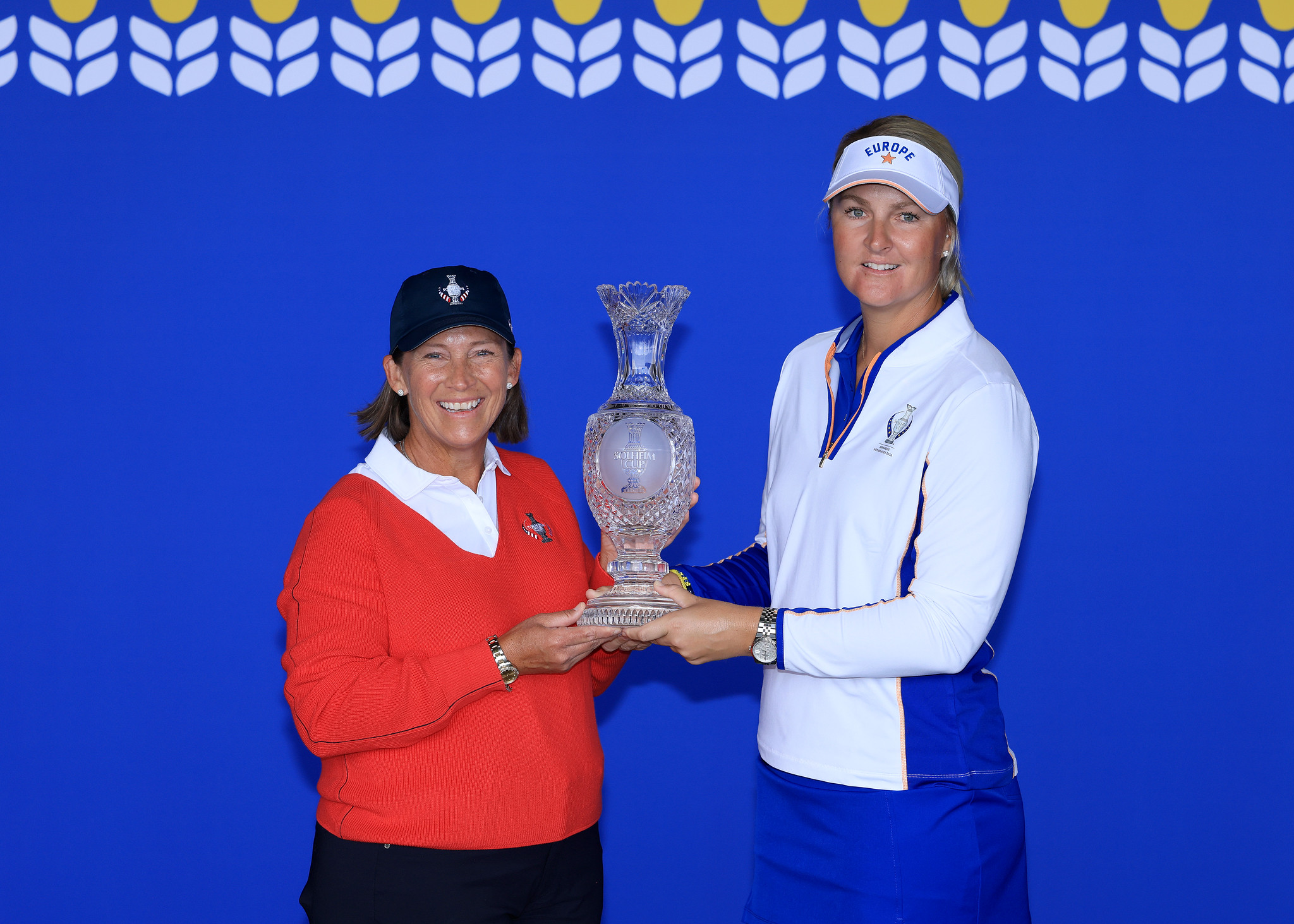 Solheim Cup captains Angela Stanford (left) and Anna Nordqvist (right) pose with the Solheim Cup.