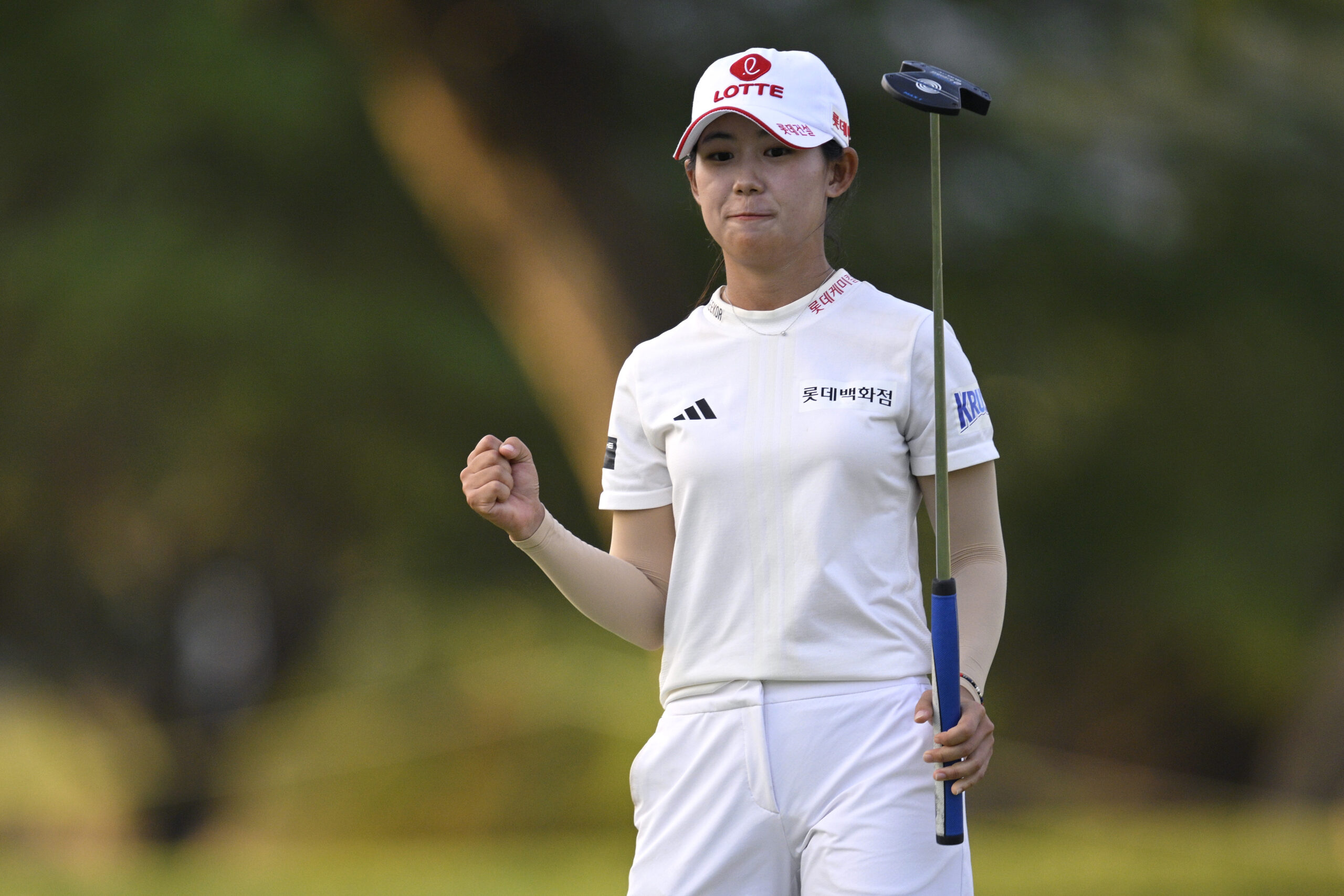 Youmin Hwang of South Korea celebrates after a putt on the 18th green during the second round of the 2025 LOTTE Championship presented by Hoakalei.