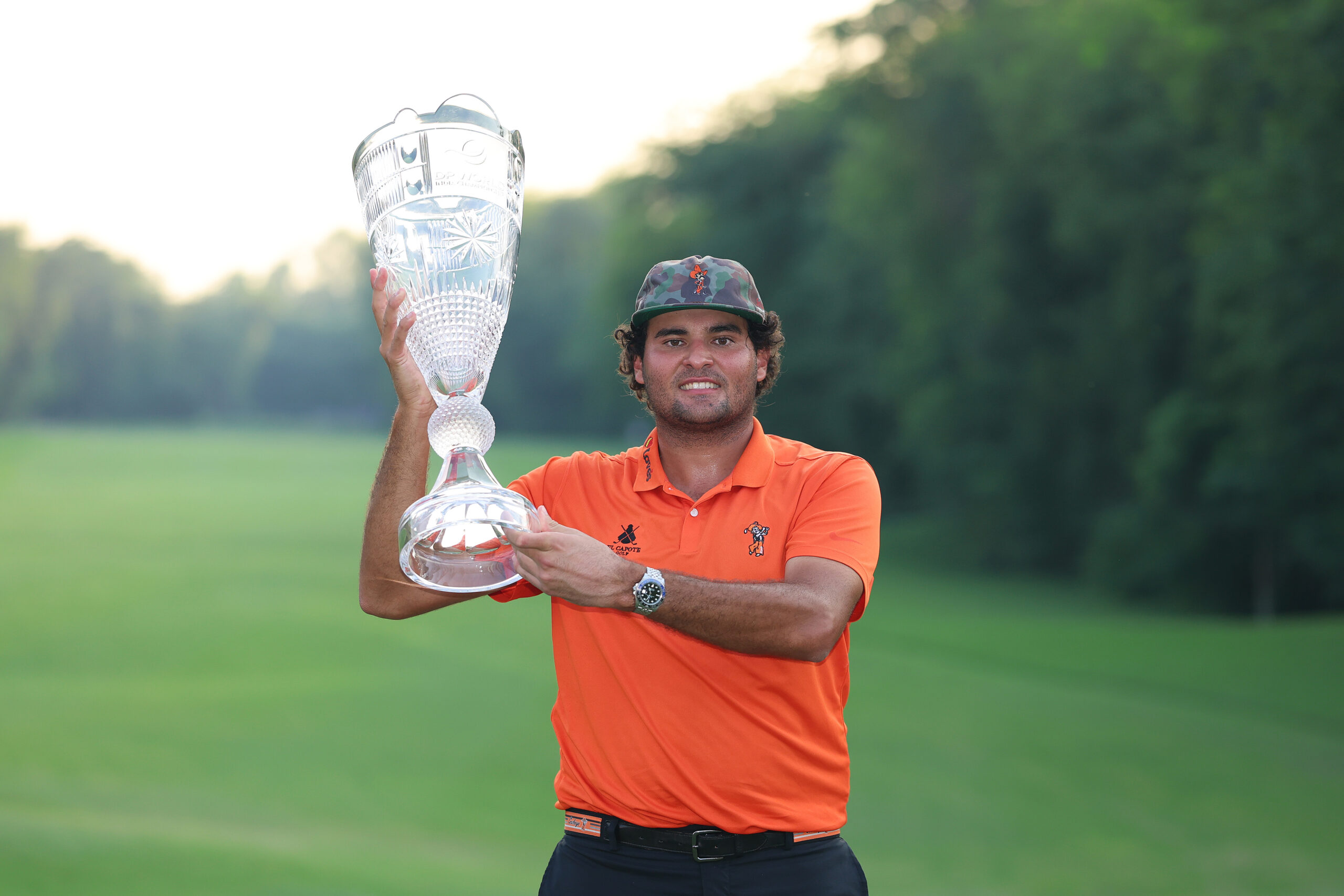 Eugenio Chacarra of Spain poses with the trophy following victory on day four of the 2026 DP World India Championship.